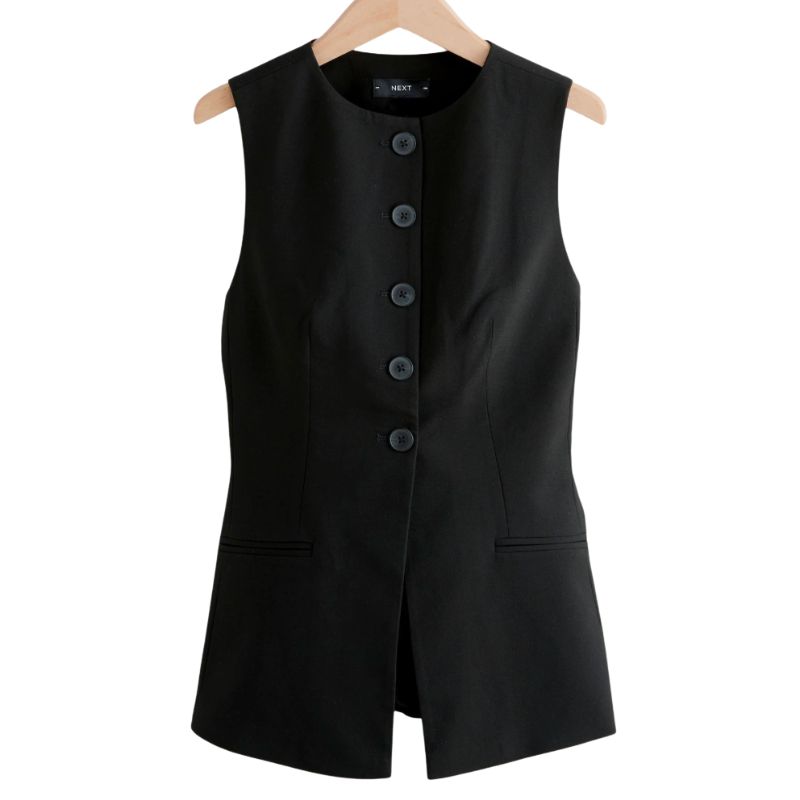 A cutout of a black longline waistcoat
