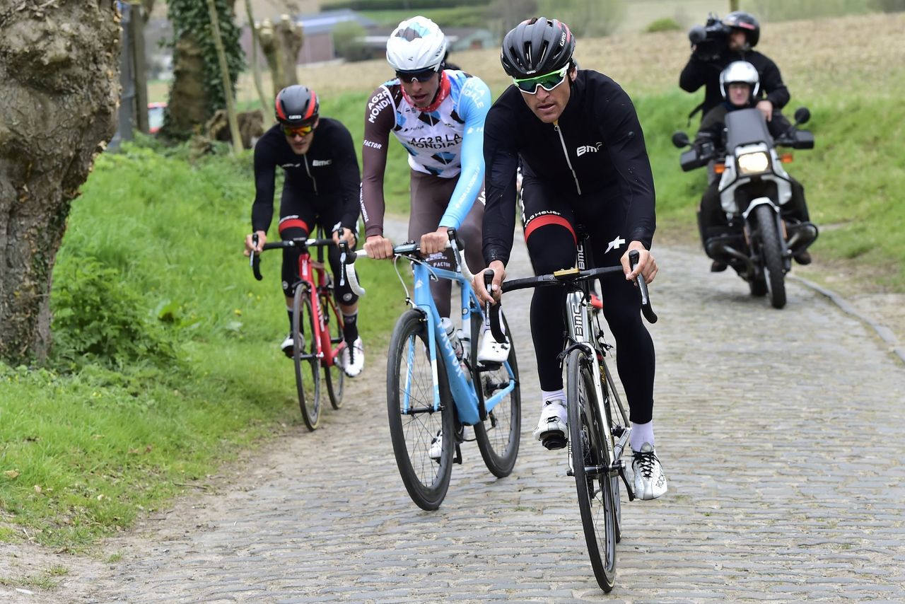 Greg Van Avermaet and Oliver Naesen recon the Oude Kwaremont.