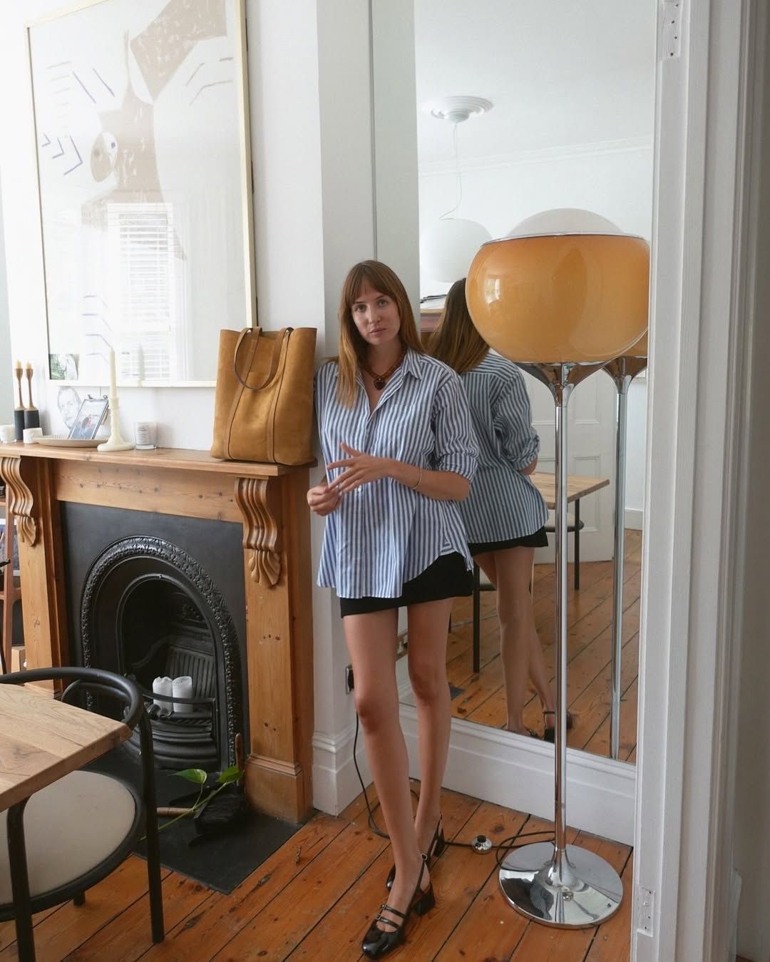 @lizzyhadfield wearing pinstripe shirt and shorts