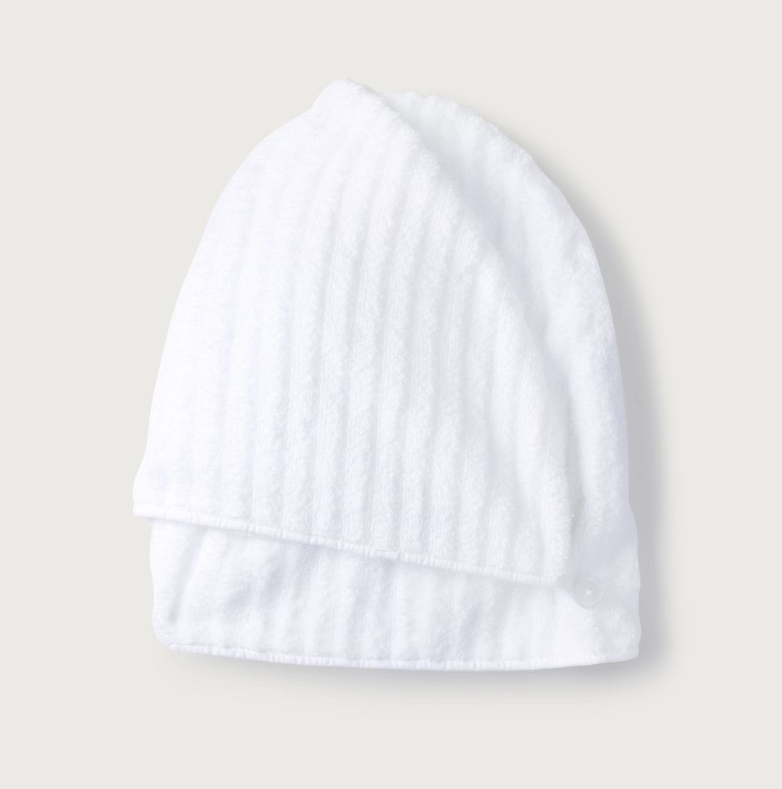 White towel hair wrap, folded in half