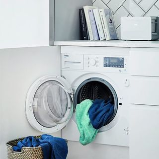 Washing machine with clothes and books