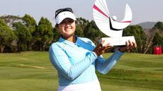 Lilia Vu with the Honda LPGA Thailand trophy