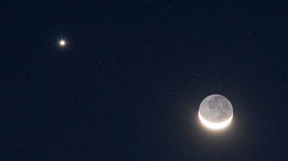 Venus and crescent moon next to each other.