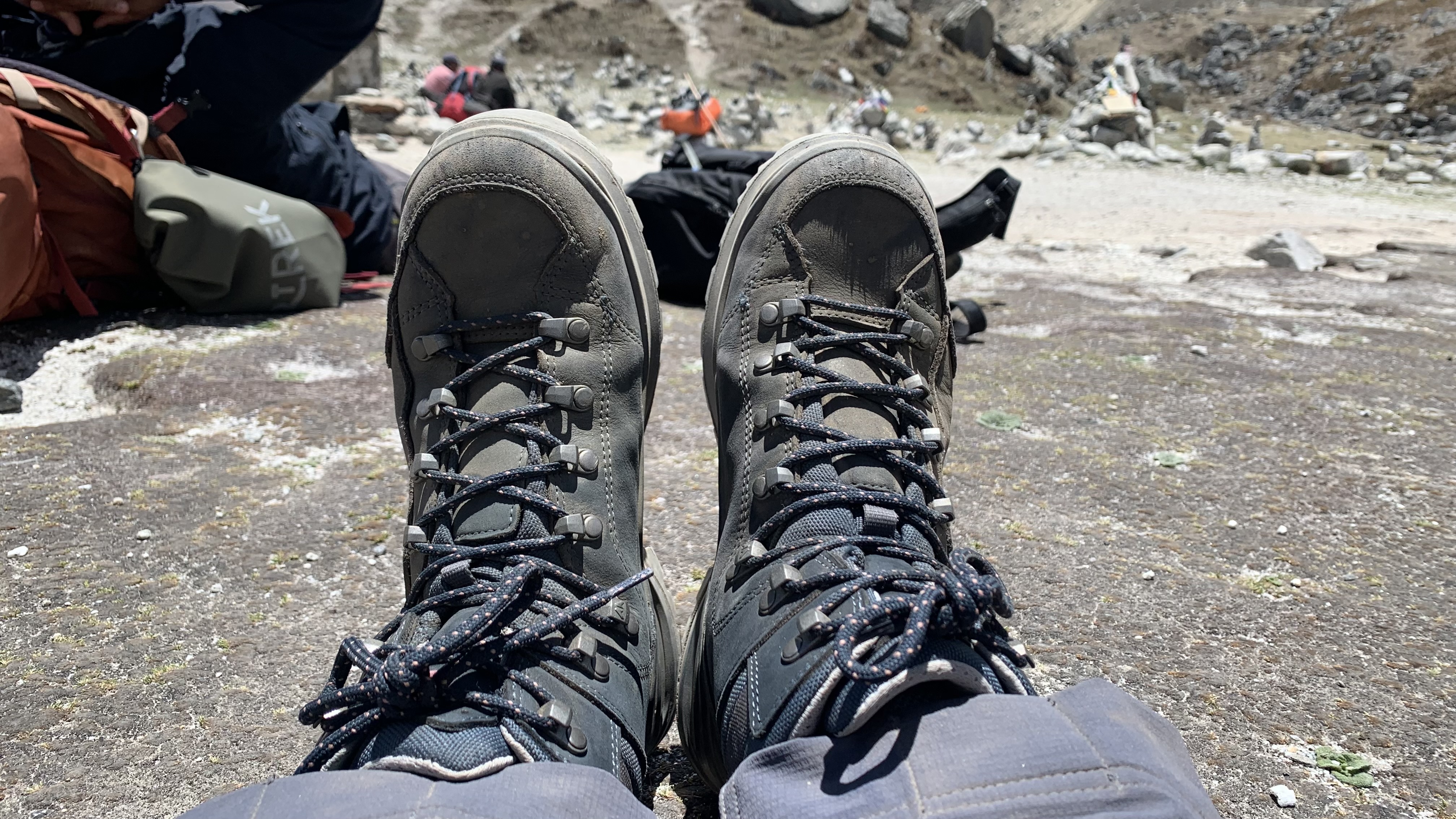 Hiker's feet wearing the Lowa Renegade EVO GTX Mid hiking boots