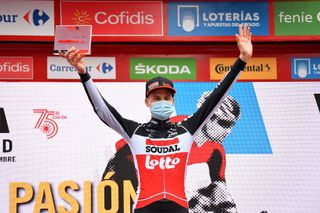 OURENSE SPAIN NOVEMBER 04 Podium Tim Wellens of Belgium and Team Lotto Soudal Celebration Trophy Mask Covid safety measures during the 75th Tour of Spain 2020 Stage 14 a 2047km stage from Lugo to Ourense lavuelta LaVuelta20 La Vuelta on November 04 2020 in Ourense Spain Photo by Justin SetterfieldGetty Images