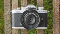 The Nikon Z fc camera on a park bench