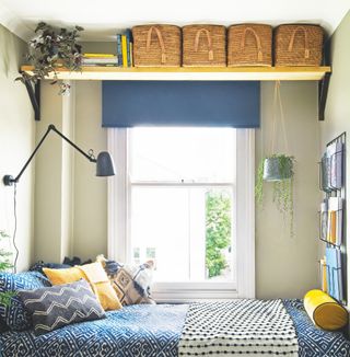 Green bedroom with shelf above window