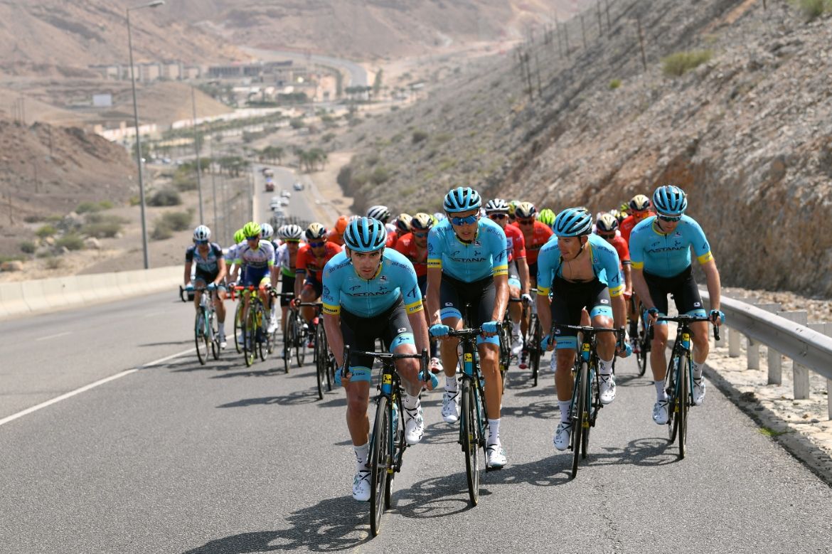 Astana lead the peloton up the Al Jabal Street climb