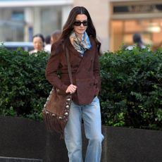 anne hathaway wears a valentino nellcote bag on the set of devil wears prada 2