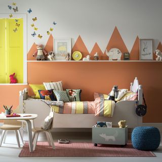 childs room with bed and toys