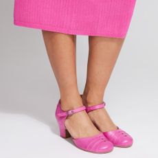 Woman wearing pink Miz Mooz 'Frenchy' heels