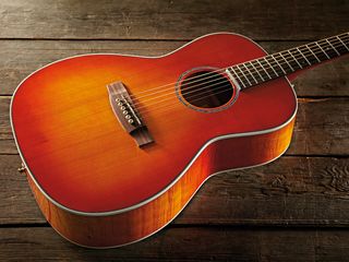 The EG630S-VV's solid spruce top sports an attractive amber finish.