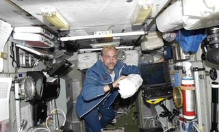Space Tourist Settles in Aboard Station 