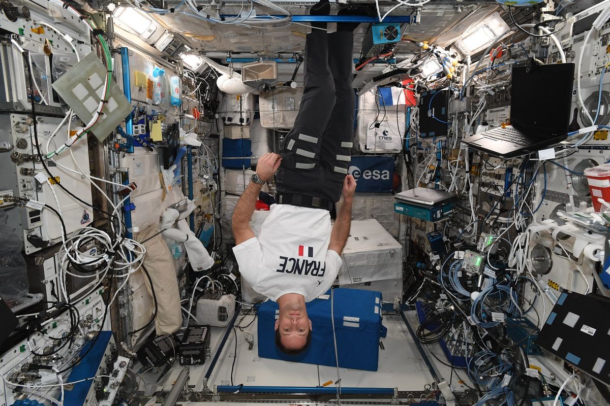 French astronaut Thomas Pesquet of the European Space Agency celebrated France's Bastille Day holiday in space with festive shirts and a meal with friends on July 14, 2021 aboard the International Space Station.