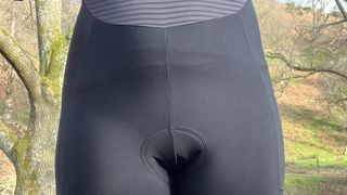 Close up of a woman's torso in cycling clothing