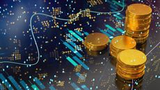 Digital trading graphic underneath stacks of gold coins representing cryptocurrency.