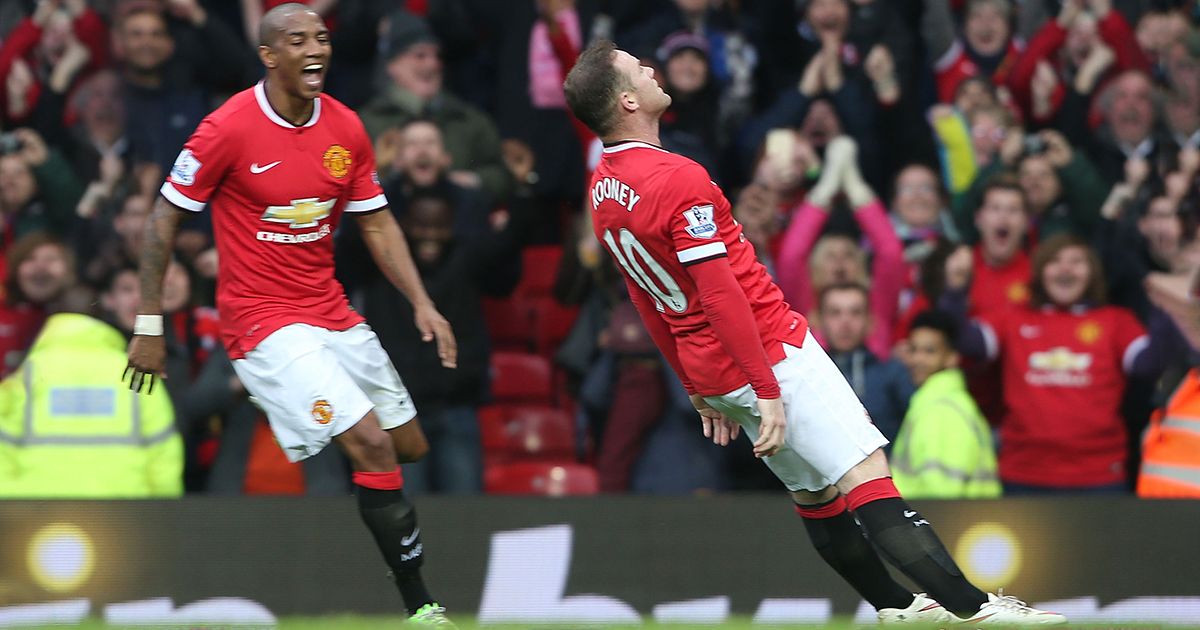 Wayne Rooney of Manchester United celebrates scoring their third goal during the Barclays Premier League match between Manchester United and Tottenham Hotspur at Old Trafford on March 15, 2015 in Manchester, England.