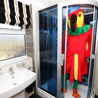 a person in a parrot costume