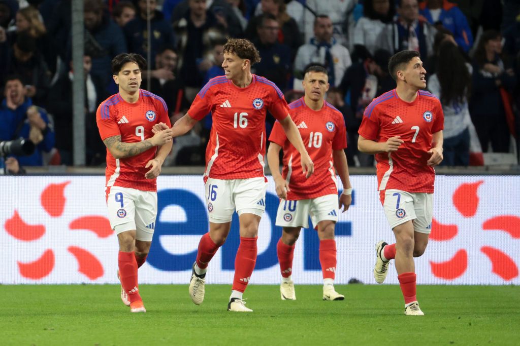 Victor Davila, Igor Lichnovsky, Alexis Sanchez, Marcelino Nunez of Chile celebrate their first goal during the international friendly match between France and Chile at Stade Velodrome on March 26, 2024 in Marseille, France.(Photo by Jean Catuffe/Getty Images)