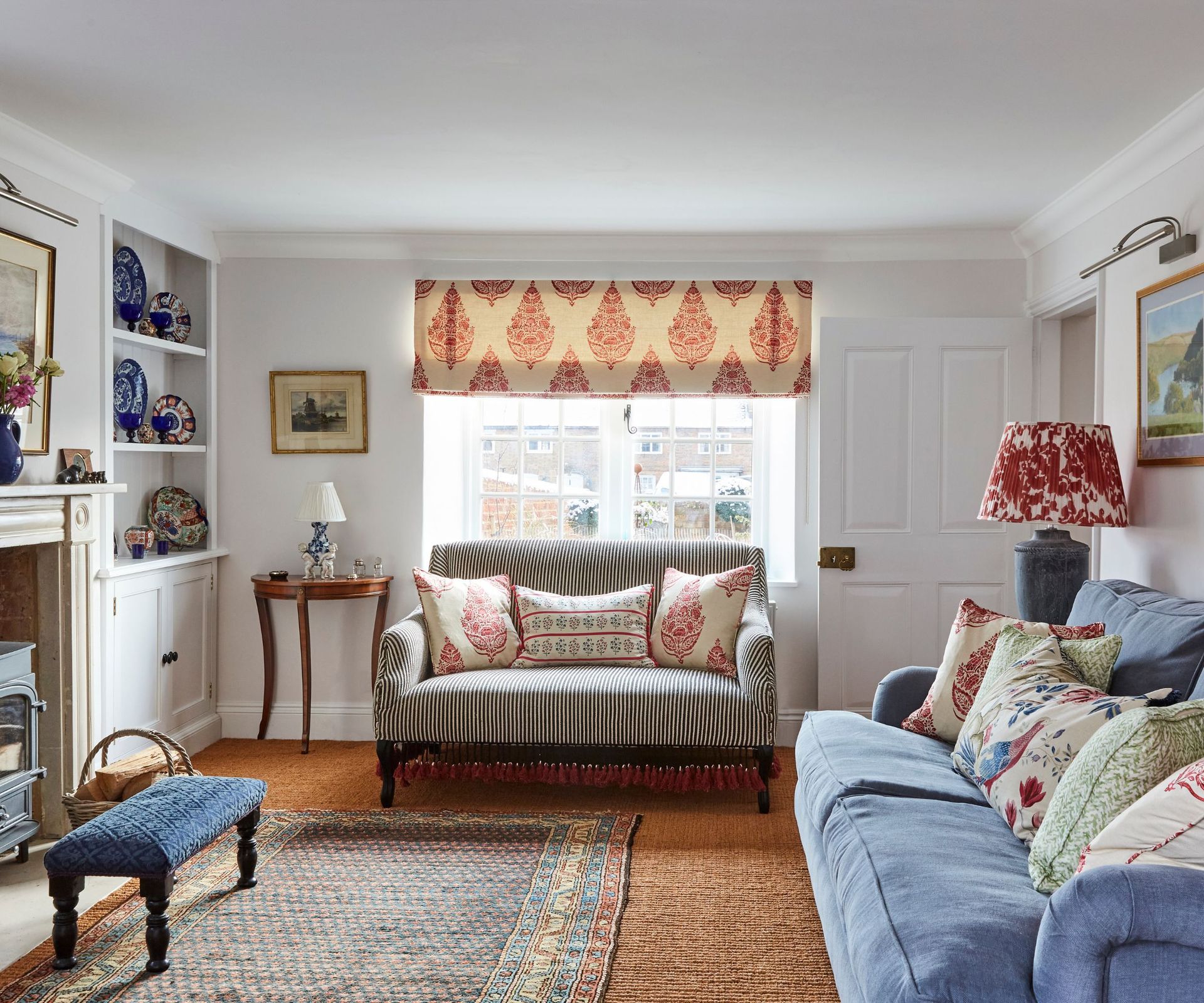 Red lampshade and drapes pattern, wooden table