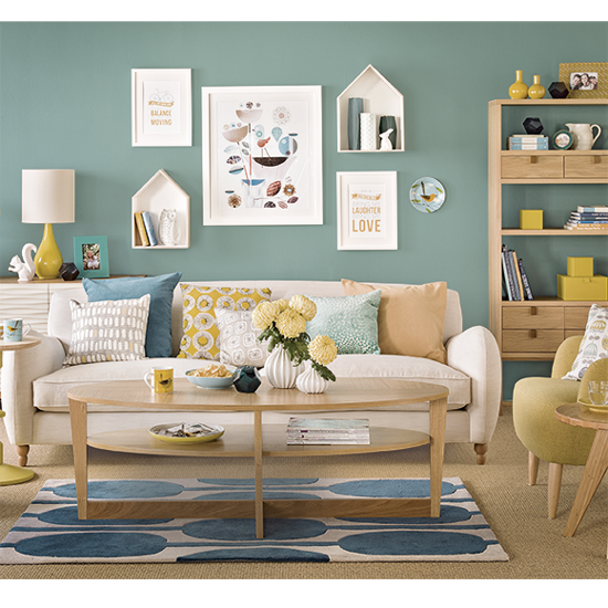 living area with sofa set and wooden shelves