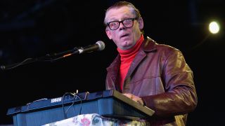 EASTNOR, ENGLAND - AUGUST 5: Comedian Graham Fellows performs as John Shuttleworth on the Castle stage during the third day of the Big Chill music festival at Eastnor Castle Deer Park in the Malvern Hills on August 5, 2007 in Herefordshire, England. (Photo by Jim Dyson/Getty Images)
