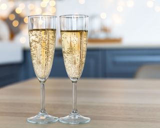 two champagne flutes on a table