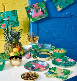 white table with tropical plates