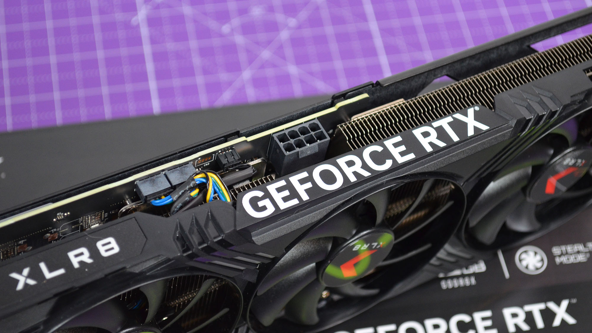 A PNY RTX 4070 XLR* graphics card next to an RTX 4070 Founders Edition