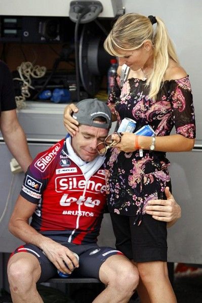 Evans gets a hug from his wife Chiara.