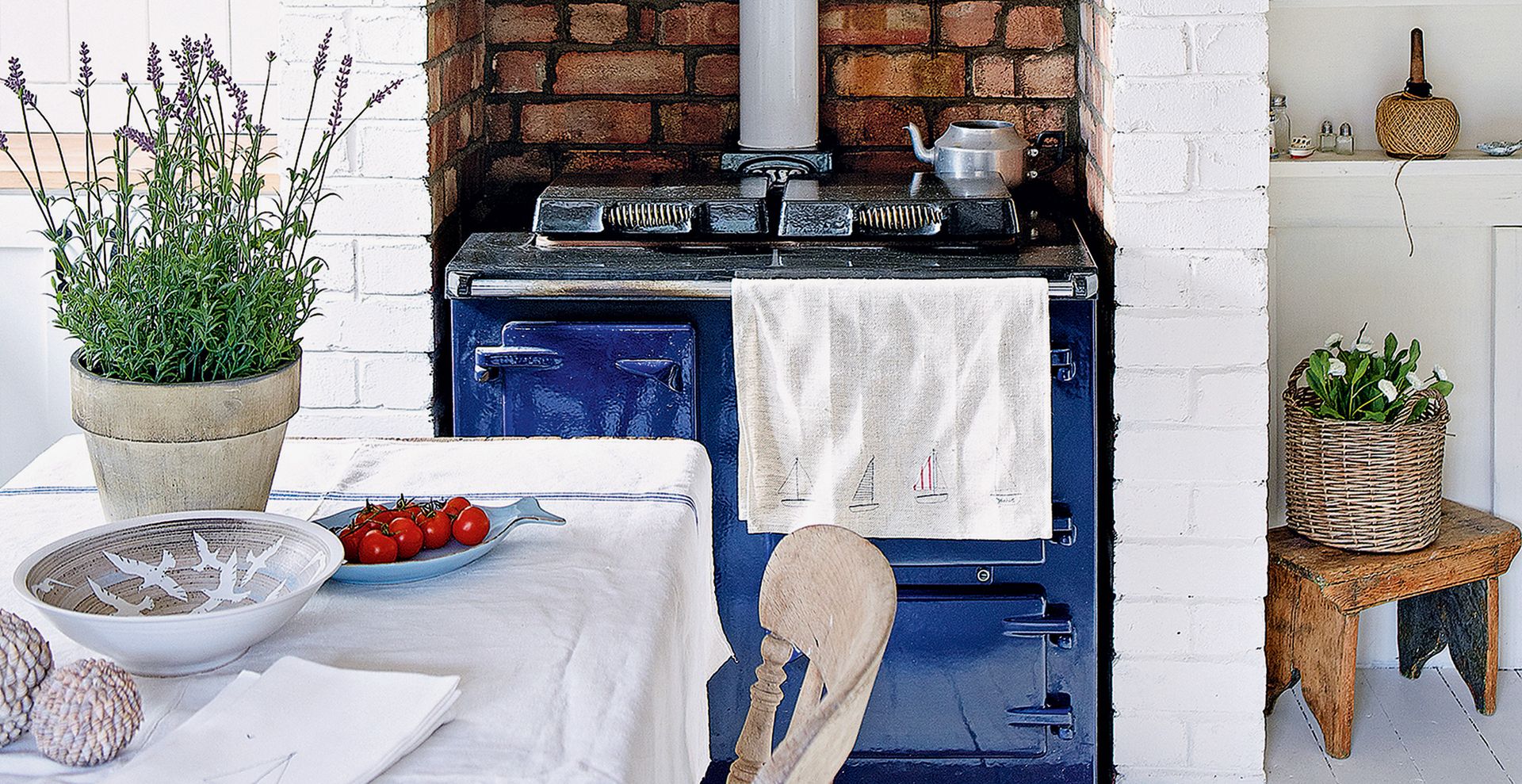 White rustic kitchen with a potted lavender to show how to keep ants away