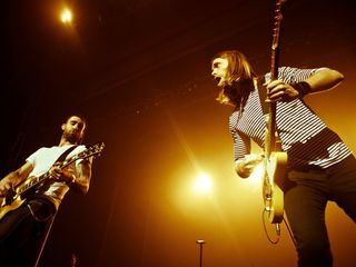 Singer-guitarist Adam Levine and lead guitarist Valentine share the spotlight, if not "The Sun"