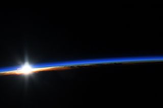 NASA astronaut Anne McClain shared this photo of a sunrise seen from space on Easter Sunday (April 21).