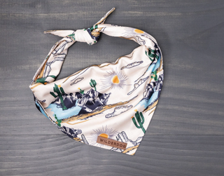 The Wilderdog bandana in the Laredo print with cacti and desert landscapes