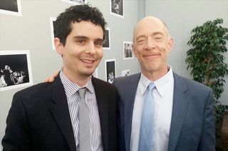 "Whiplash" director Damien Chazelle (left) and star J.K. Simmons seen together at the 2014 Cannes Film Festival. Chazelle is in talks with Universal Studios to direct "First Man" about Neil Armstrong.