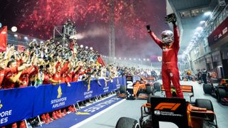 Ferrari’s Sebastian Vettel celebrates his victory at the 2019 F1 Singapore Grand Prix