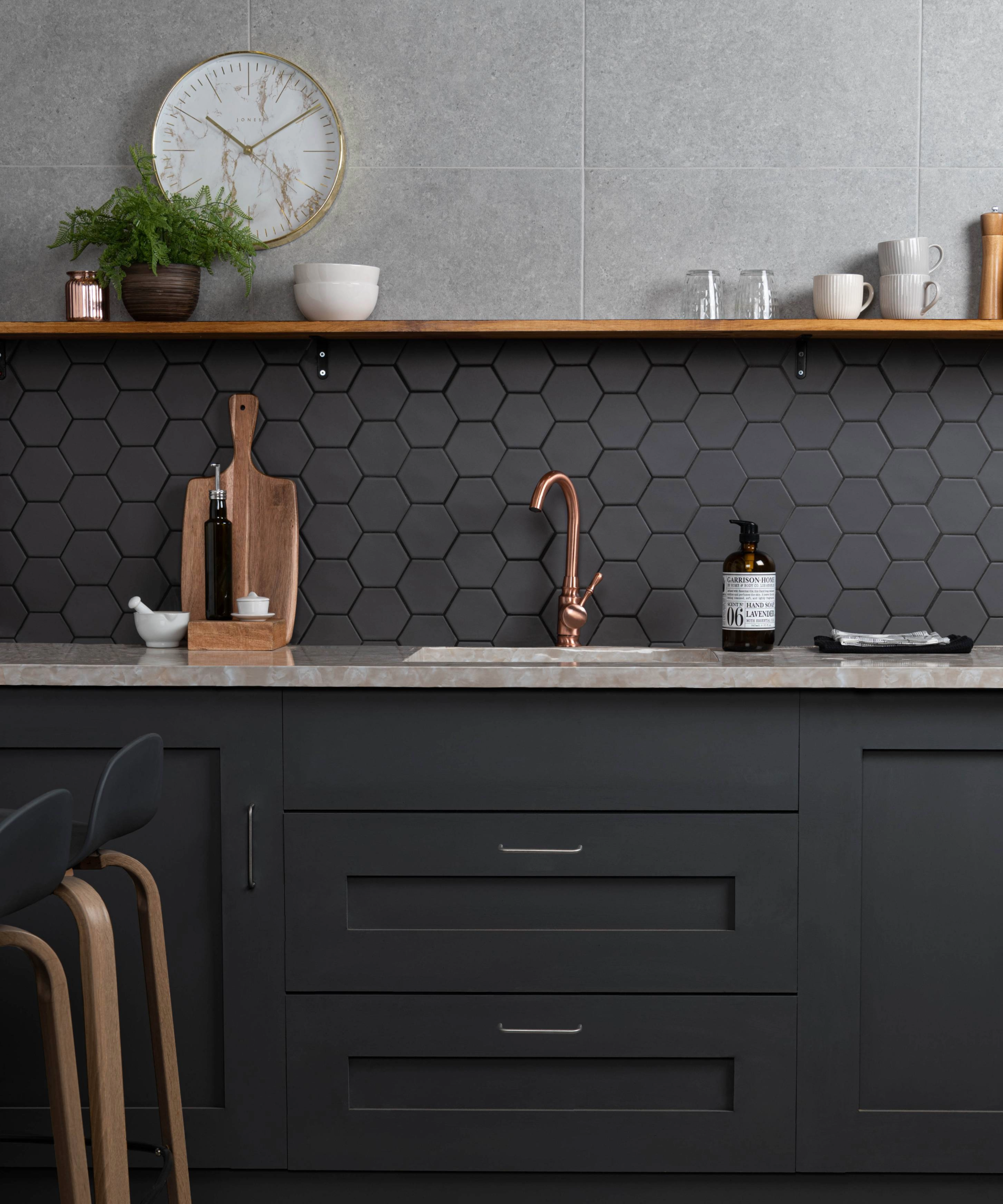 Black hexagon tiles in a kitchen