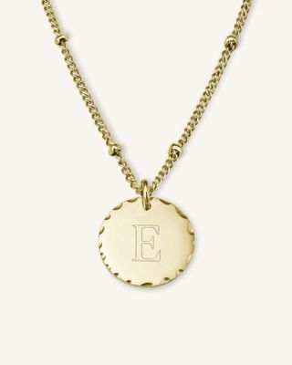 14k gold plated initial gold coin pendant £59, rosefieldwatches.com
