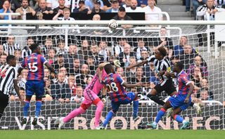 Newcastle player Joe Willock is challenged by Tyrick Mitchell and Vicente Guaita is beaten but the goal is disallowed after a VAR review during the Premier League match between Newcastle United and Crystal Palace at St. James Park on September 03, 2022 in Newcastle upon Tyne, England. (Photo by Stu Forster/Getty Images)