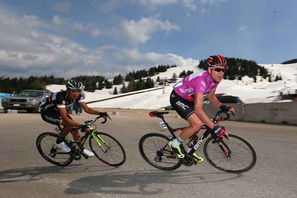 Cadel Evans (R) of Australia and BMC Racing Team races ahead of Fabio Duarte Arevalo (L) of Colombia during stage four of the 2014 Giro del Trentino