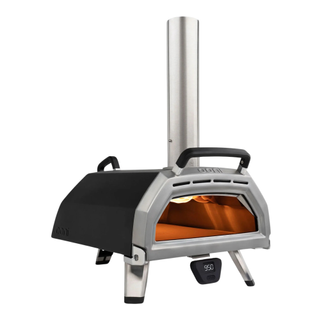 A black Ooni karu outdoor pizza oven