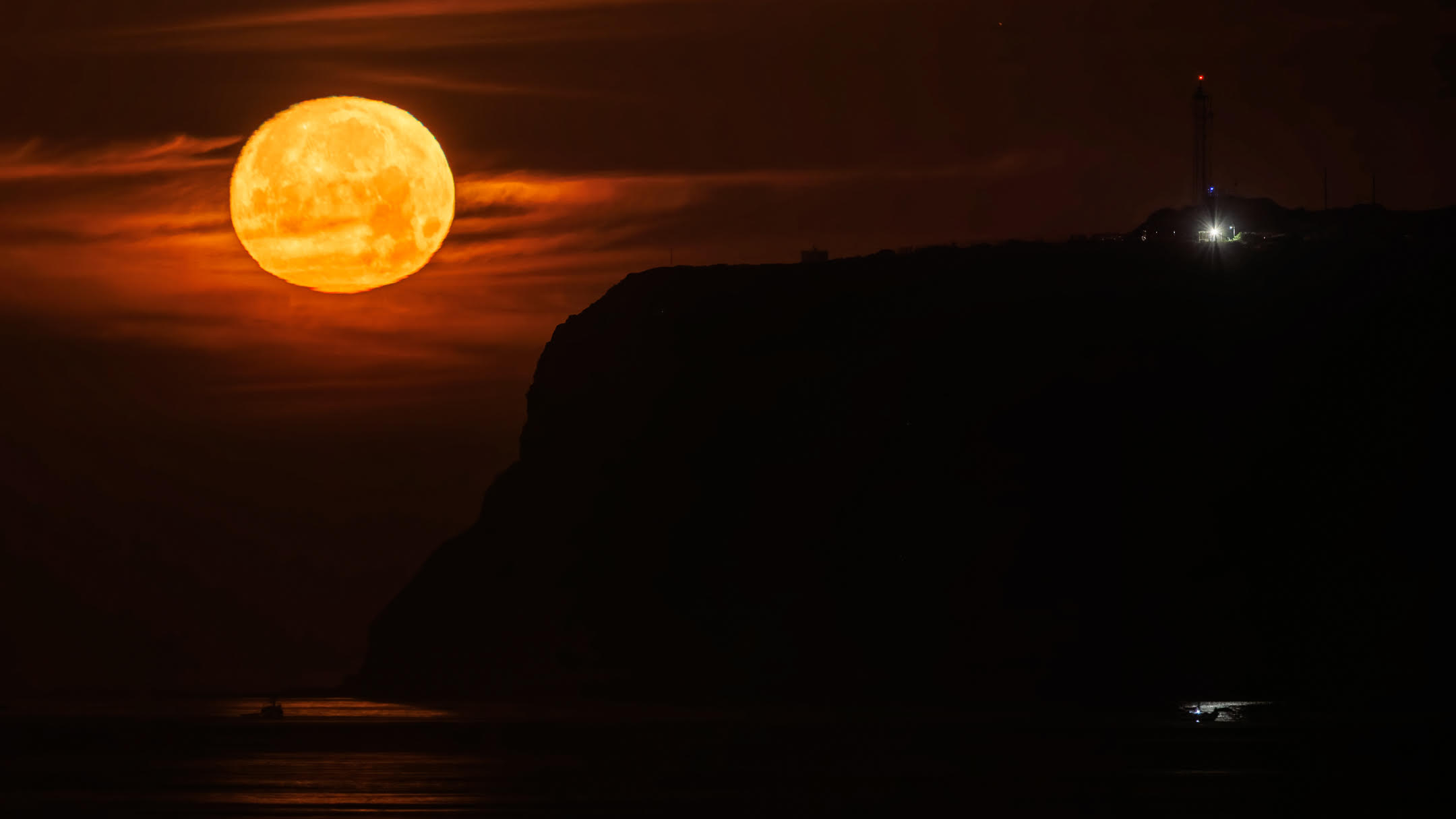 The May 2025 Flower Moon is pictured prior to setting on the morning of May 11 in California.