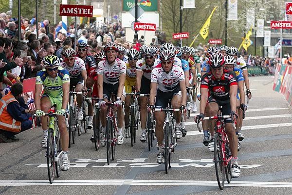 Andy Schleck comes in and looks at the big screen to see how his brother did.