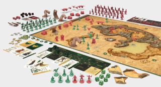 game components and map from Dune: War for Arrakis, including dice, cards, and minis
