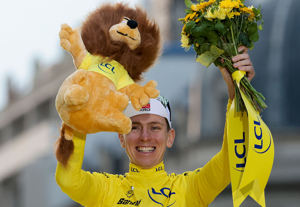 ;PARIS - CHAMPS-ELYSEES, FRANCE - JULY 27: Tadej Pogacar of Slovenia and UAE Team Emirates - XRG wins the race leader&amp;amp;apos;s yellow jersey during the final podium ceremony following Stage 21 of the 112th Tour de France 2025, a 132,3 km stage from Mantes-la-Ville to Paris, Champs-Elysees on July 27, 2025 in Paris, France. (Photo by Jean Catuffe/Getty Images)