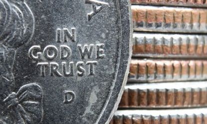 After 35 minutes of debate, The House of Representatives set the record straight Wednesday about the country's motto, which is displayed on the quarter.