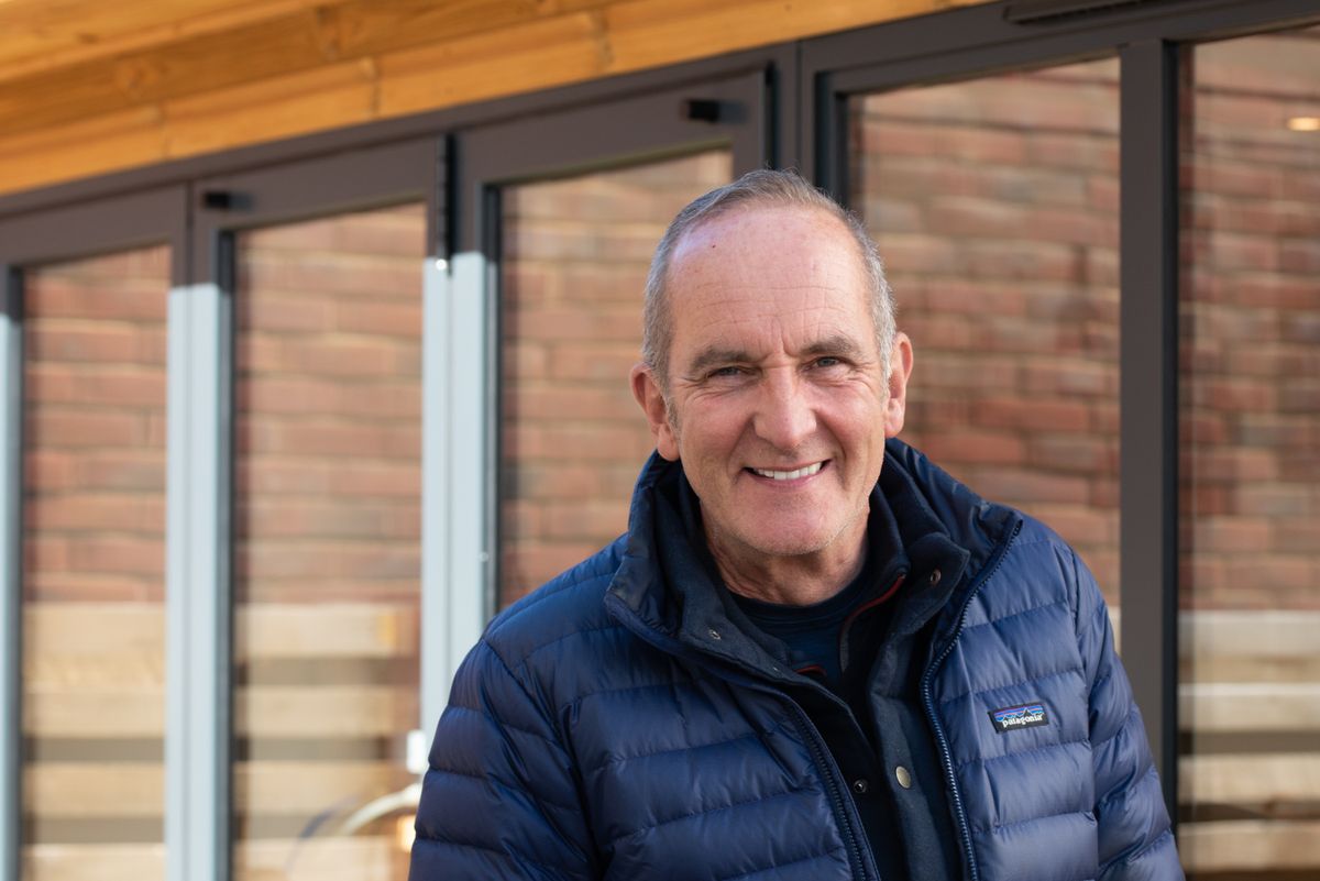 Grand Designs: The Streets season 3. Kevin McCloud outside a house.