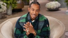 ludacris in a neutral chair