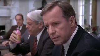 Phil Hartman speaks while Kevin McCarthy eyes some Pepto Bismol in The Second Civil War.