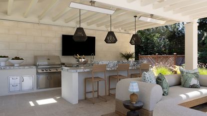 An outdoor kitchen connected to a living area